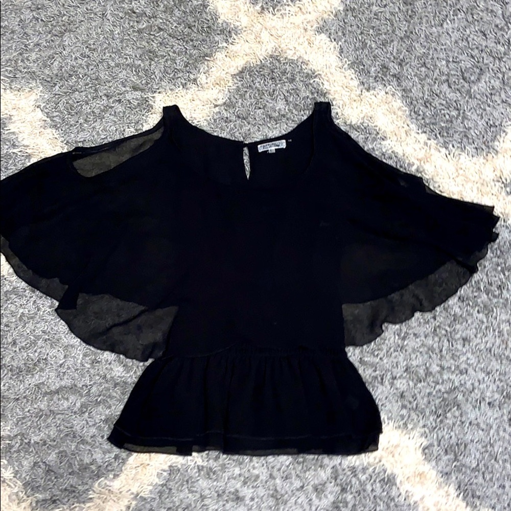 Cold shoulder top. Cinched at the waist.